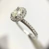 .80 Oval Cut Diamond with Halo and Side Stones